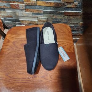 TOMS black canvas slip on sneakers
